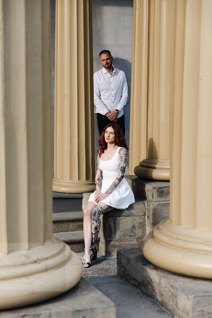 Couple standing on the steps at Dundurn Castle, soft evening light—classic architectural portrait.
